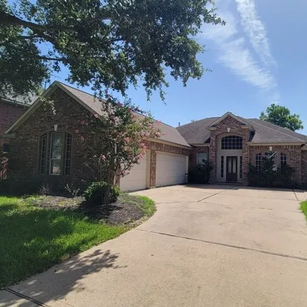 Rent this 3 bed house on 14410 Floret Estates Ln in Cypress, Texas