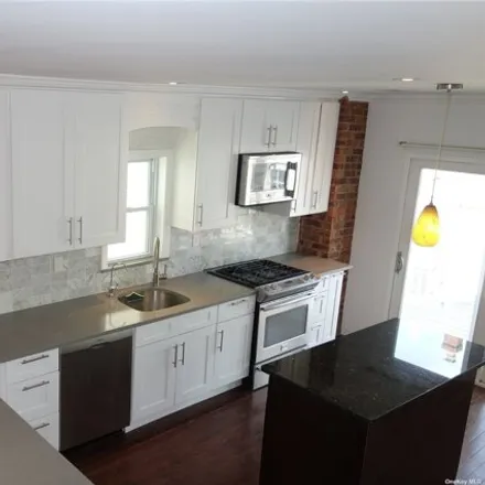 Rent this 4 bed house on 77-43 66th Road in New York, NY 11379