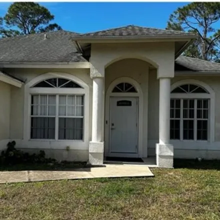 Rent this 3 bed house on 2163 Hamilton Avenue in Lehigh Acres, FL 33920