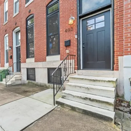 Buy this 4 bed house on 403 East Lafayette Avenue in Baltimore, MD 21202