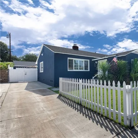Buy this 4 bed house on 6126 Oliva Avenue in Lakewood, CA 90712