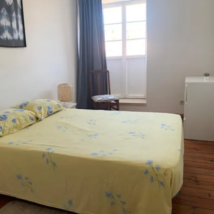 Rent this 2 bed apartment on Rua da Cruz a Alcântara in 1300-023 Lisbon, Portugal