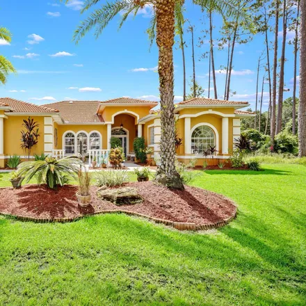 Buy this 4 bed house on Grand Club Cypress Course in Evanston Place, Palm Coast