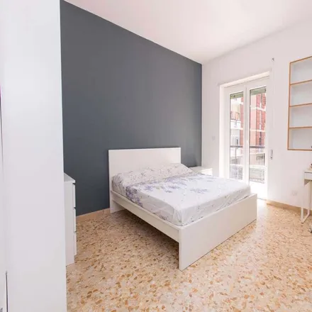 Rent this 4 bed room on Rue Burger Roma Marconi in Via Oderisi da Gubbio, 198
