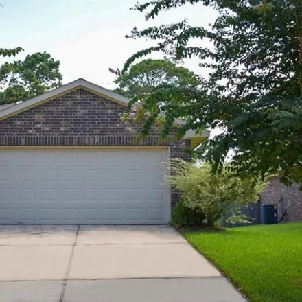 Rent this 3 bed house on 13457 Raintree Drive in Montgomery County, TX 77356