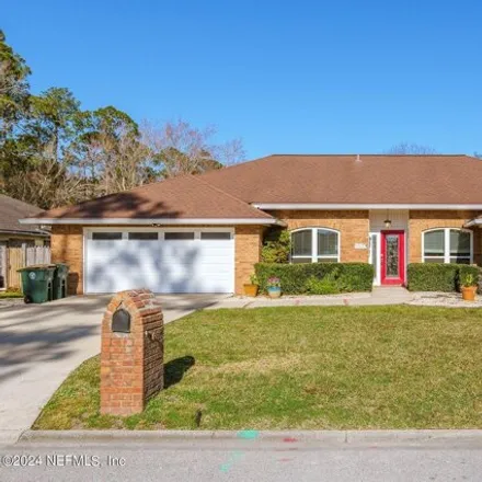 Buy this 4 bed house on 11953 Oldfield Pointe Drive in Jacksonville, FL 32223