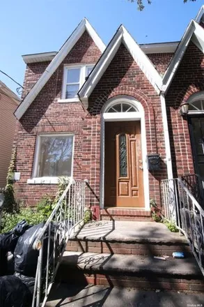 Buy this 4 bed house on 120-86 131st Street in New York, NY 11420