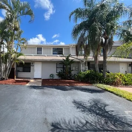 Rent this 4 bed house on 5233 Tennis Lane in Palm Beach County, FL 33484