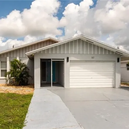 Rent this 3 bed house on 517 98th Ave N in Naples, Florida