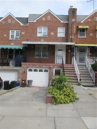 Buy this 4 bed townhouse on 2922 Laconia Avenue in New York, NY 10469
