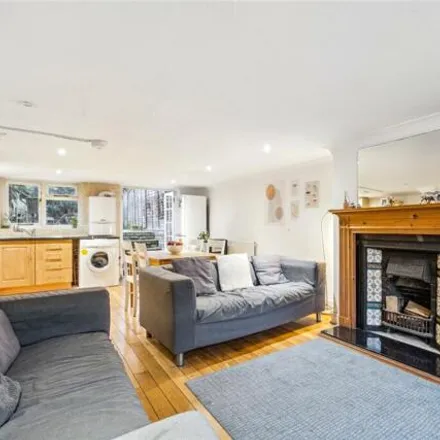 Buy this 4 bed townhouse on The Brunswick Club for Young People in 34 Haldane Road, London