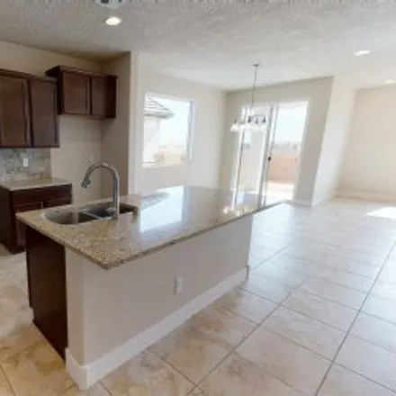 Rent this 4 bed apartment on 6709 Delgado Way Northeast