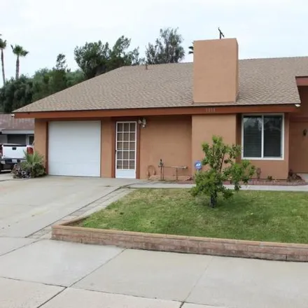 Rent this 4 bed house on 5050 Pearblossom Drive in Riverside, CA 92507