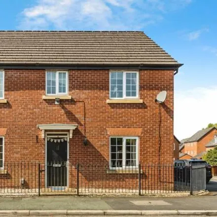 Rent this 4 bed house on Croughton Close in Manchester, M11 1WP