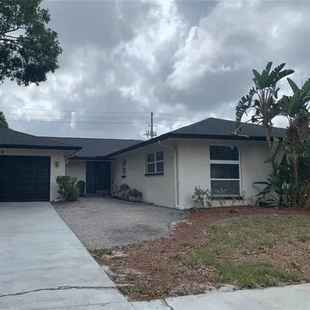 Rent this 4 bed house on 3138 Belcher Road in Dunedin, FL 34698