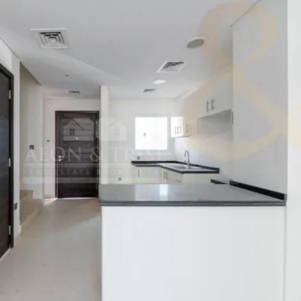 Image 5 - Akoya Sancnary, Damac Hills 2, Dubai, United Arab Emirates - Townhouse for rent