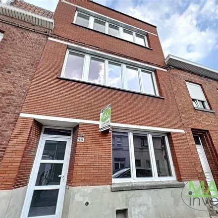 Rent this 4 bed apartment on Rue de l'Église - Kerkstraat 45 in 7700 Mouscron, Belgium