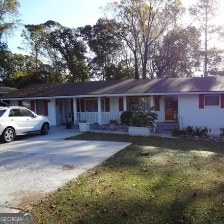 Buy this 4 bed house on 3248 Clifton Church Road Southeast in Panthersville, GA 30316