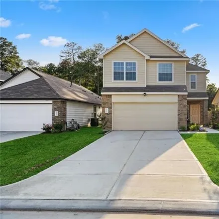 Buy this 4 bed house on Raider Drive in Conroe, TX