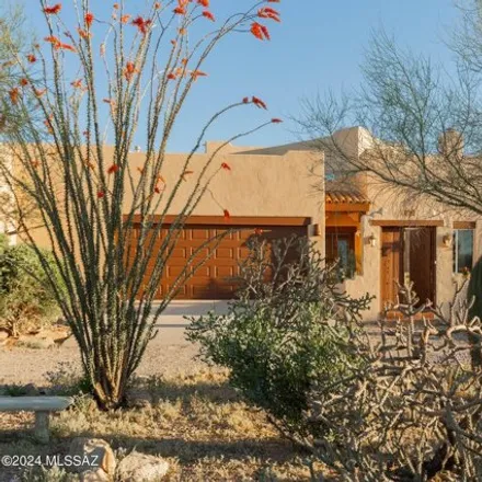 Buy this 4 bed house on 1364 North Dusty Hollow Court in Pima County, AZ 85745