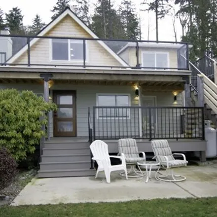 Buy this 4 bed house on 4075 Beach Drive East in Waterman Point, Kitsap County