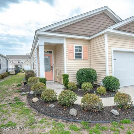 Buy this 3 bed house on Rocking Porch Lane in Carolina Shores, Brunswick County