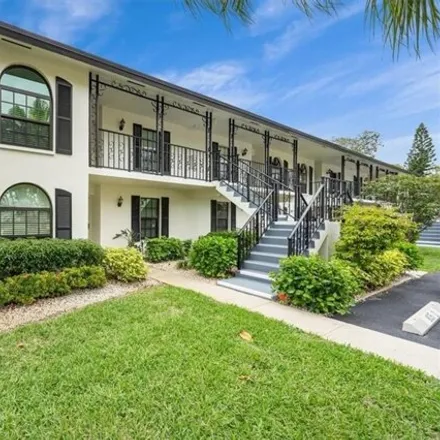 Buy this 2 bed condo on Royal Palm Country Club in Forest Hills Boulevard, Lely Golf Estates