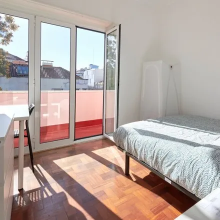Rent this 11 bed room on Avenida Defensores de Chaves 52 in 1000-120 Lisbon, Portugal