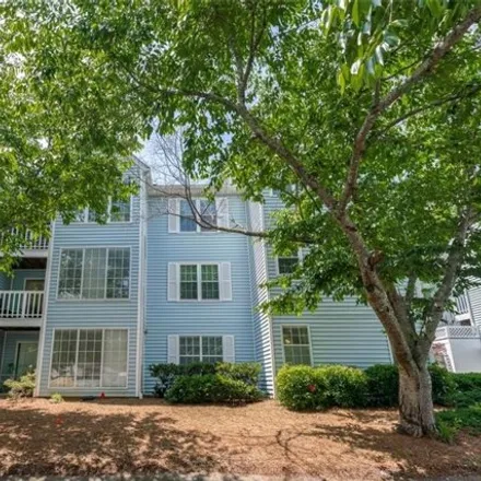 Buy this 2 bed condo on Parton Court in Peachtree Corners, GA 30092