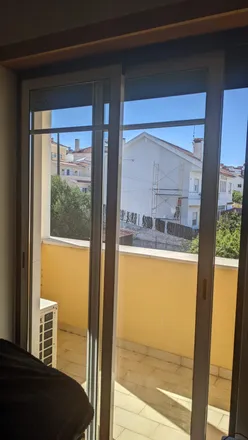 Rent this 4 bed room on Rua António Sacramento in 2785-575 São Domingos de Rana, Portugal