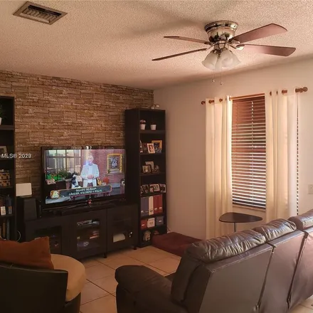 Rent this 3 bed apartment on 15498 Northwest 12th Court in Pembroke Pines, FL 33028