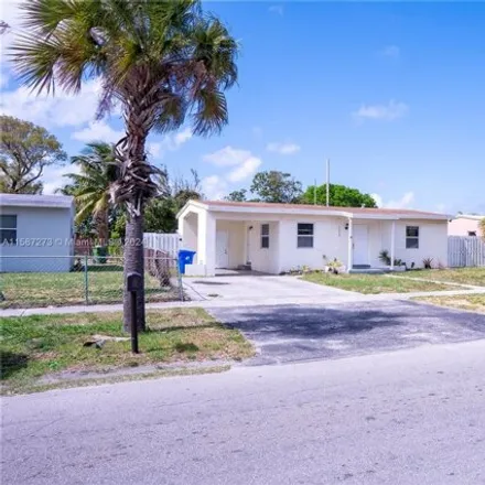 Rent this 3 bed house on 1247 Northwest 10th Place in Fort Lauderdale, FL 33311