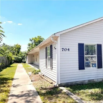 Rent this 2 bed house on 403 Southeast F Street in Bentonville, AR 72712