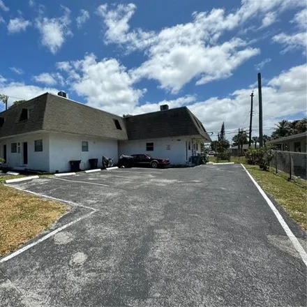 Buy this 8 bed house on 711 Southwest 5th Street in Dania Beach, FL 33004