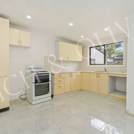 Rent this 3 bed apartment on Granville South High School in 53 Rowley Road, Guildford NSW 2161
