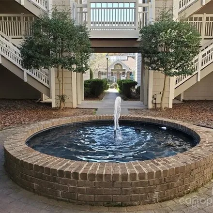 Buy this 2 bed condo on 5009 Sharon Road in Charlotte, NC 28210