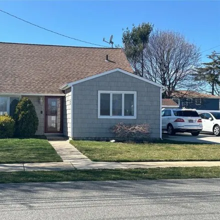 Buy this 4 bed house on 15 North Emerson Avenue in Amity Harbor, Copiague