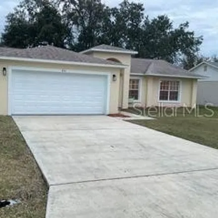 Rent this 3 bed house on 676 McKinley Court in Poinciana, FL 34758