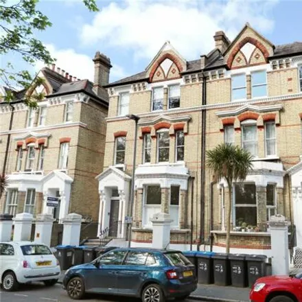 Buy this 2 bed townhouse on St Andrew's Square in London, KT6 4EG