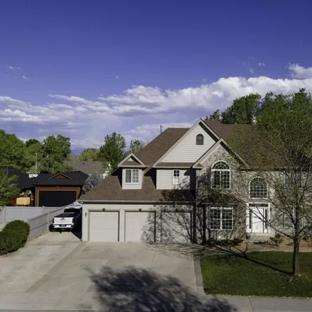 Buy this 4 bed house on 702 Woodland Country Drive in Grand Junction, CO 81507