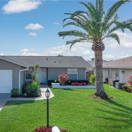 Buy this 3 bed house on 9863 Owlclover St in Fort Myers, Florida