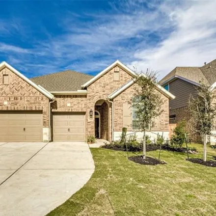 Rent this 4 bed house on 9418 Stablewood Lakes Ln in Tomball, Texas