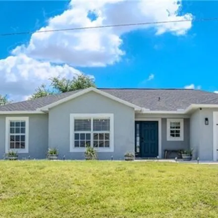 Buy this 3 bed house on 1057 Northwest 15th Place in Cape Coral, FL 33993