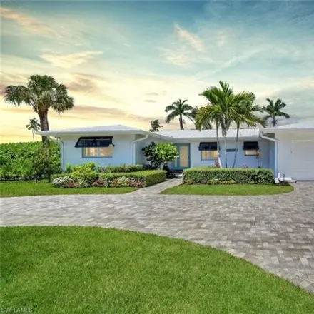 Rent this 4 bed house on 367 Mooring Line Drive in Naples, FL 34103