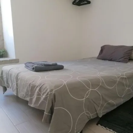 Rent this 17 bed room on Rua do Cruzeiro in 1300-166 Lisbon, Portugal