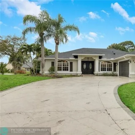 Buy this 4 bed house on 629 Southeast Dean Terrace in Port Saint Lucie, FL 34984