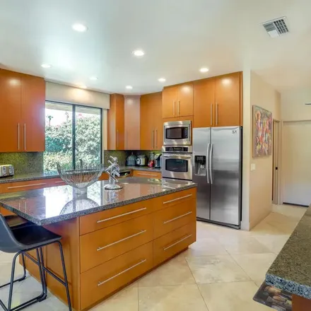 Rent this 3 bed apartment on 48700 Eisenhower Drive in La Quinta, CA 92253