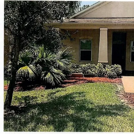 Rent this 3 bed house on 3317 Burdock Avenue in West Melbourne, FL 32904