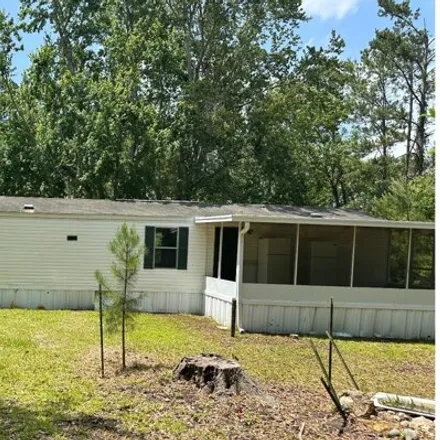 Buy this studio apartment on 63rd Drive in Suwannee County, FL