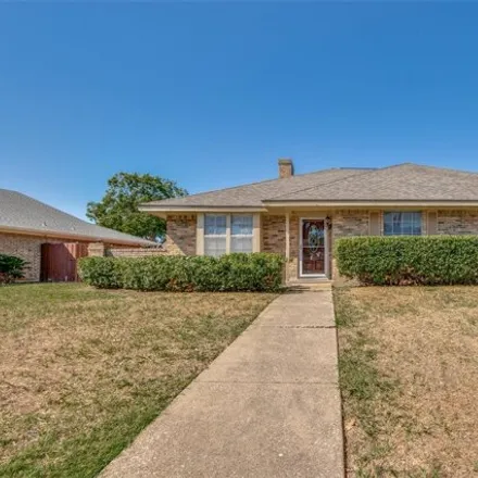 Buy this 4 bed house on 839 Woodhaven Lane in Garland, TX 75040